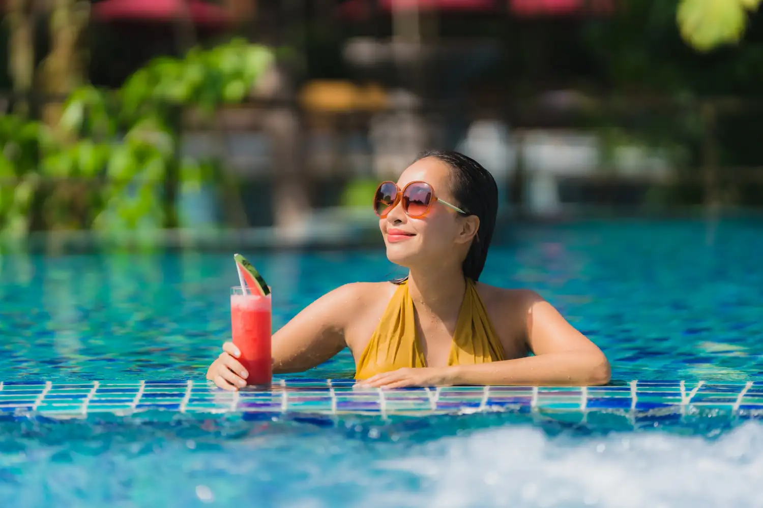 Women enjoying at poolside